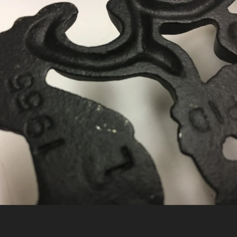 Wilton Cast Iron T-11 Cupid and Eagle & Laurel Wreath Design Trivets Set of Two